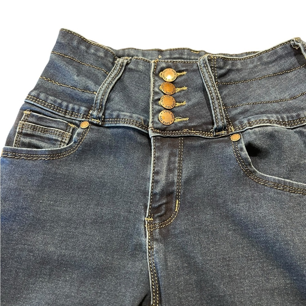 Love You skinny jeans with a four button and zipper fly.